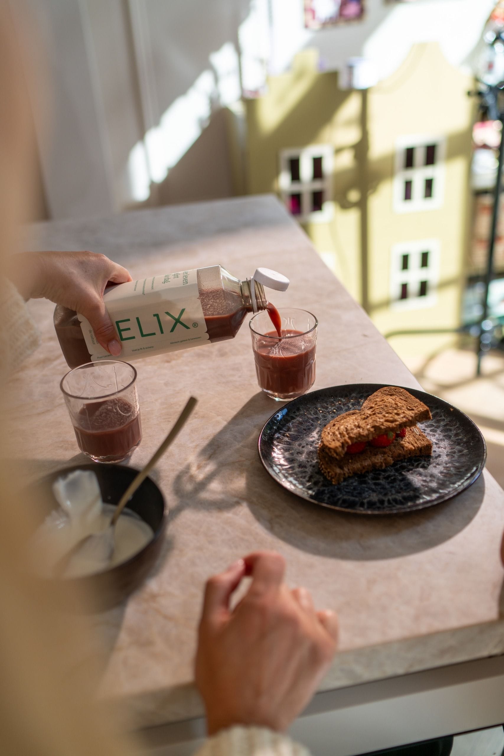 Pouring elix at breakfast