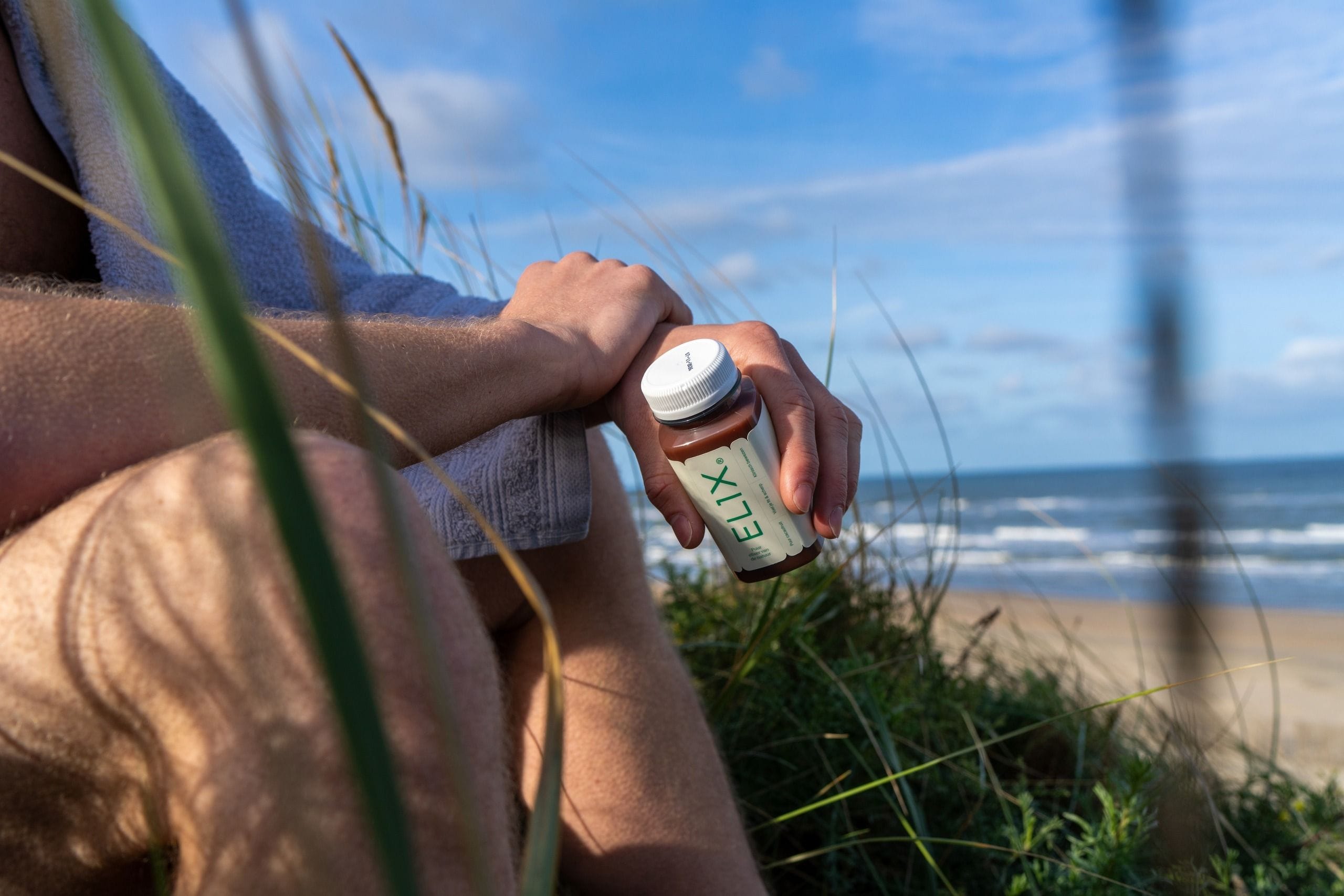 Elix bottle at beach